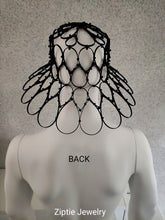 Load image into Gallery viewer, Black avant-garde sculptural hat made from zip ties worn by a mannequin.