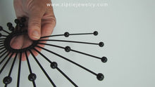 Load and play video in Gallery viewer, Futuristic Black Spike Ear Cuff
